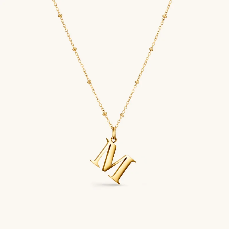 M Initial Pendant Necklace In Gold