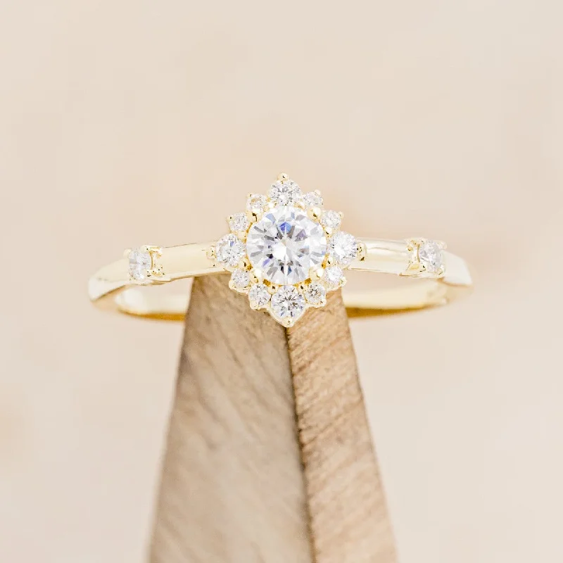 "STARLA" - ROUND CUT MOISSANITE ENGAGEMENT RING WITH STARBURST DIAMOND HALO