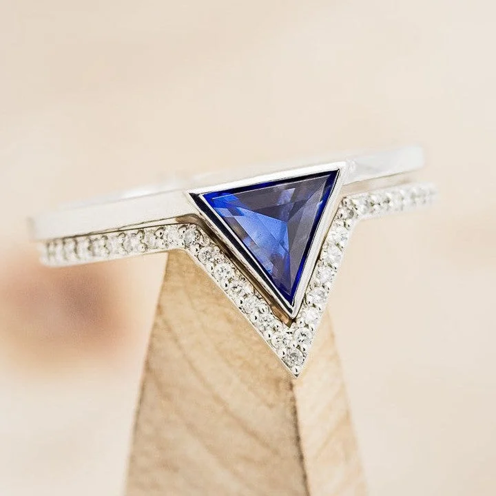 "JENNY FROM THE BLOCK" - TRIANGLE CUT LAB-GROWN BLUE SAPPHIRE ENGAGEMENT RING WITH V-SHAPED DIAMOND BAND