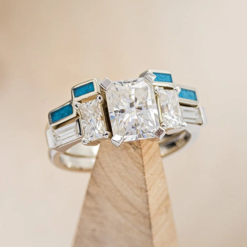 "GRETA" - EMERALD CUT MOISSANITE ENGAGEMENT RING WITH DIAMOND ACCENTS & TURQUOISE TRACER