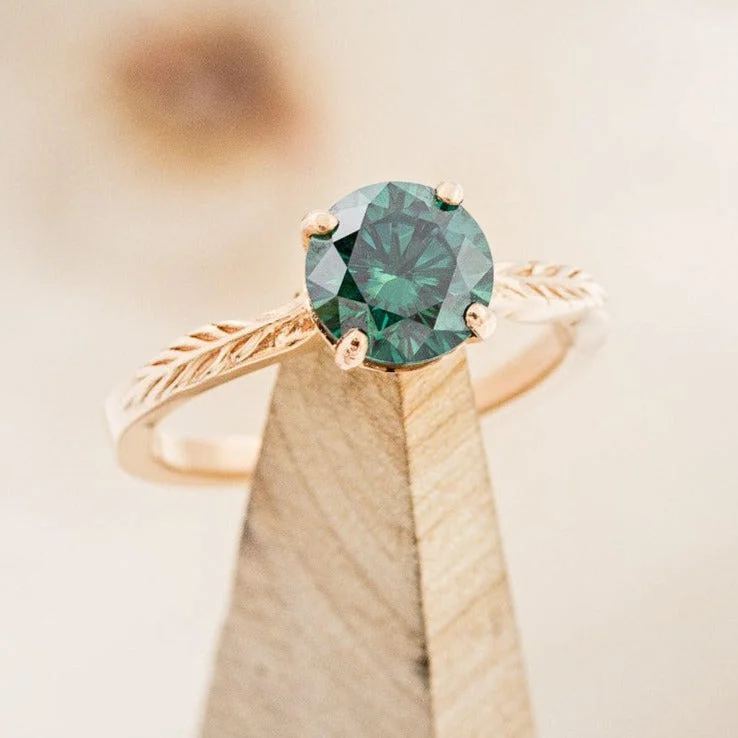 "HOPE" - ROUND CUT MEDEINA GREEN MOISSANITE SOLITAIRE ENGAGEMENT RING WITH FEATHER ACCENTS