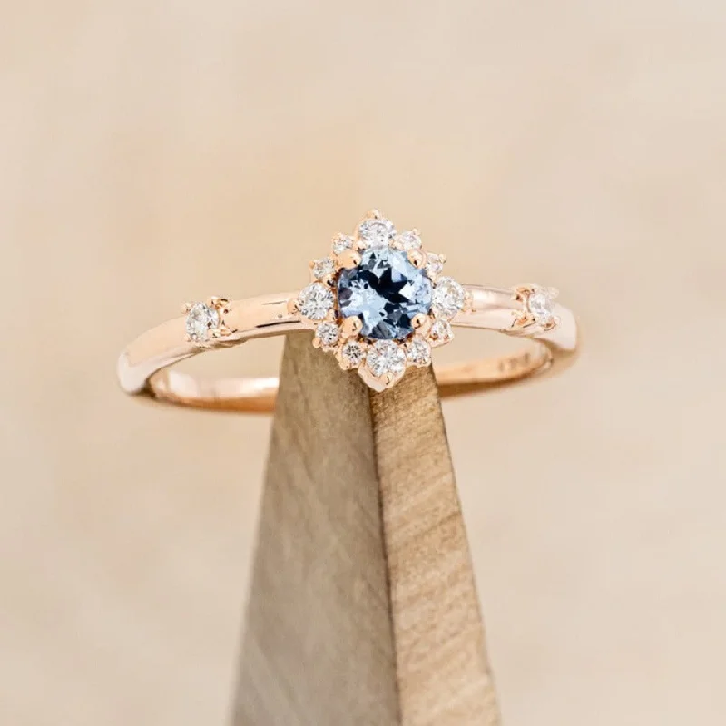 "STARLA" - ROUND CUT AQUAMARINE ENGAGEMENT RING WITH STARBURST DIAMOND HALO